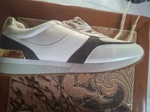 Andi Trainers In Brown( Micheal Kors)