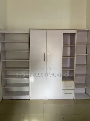 Slightly Used Large Wardrobe With Shoe and Bag Rack.