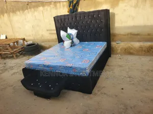 Executive 6 X 6 Upholstery Bedframe With an Ottoman