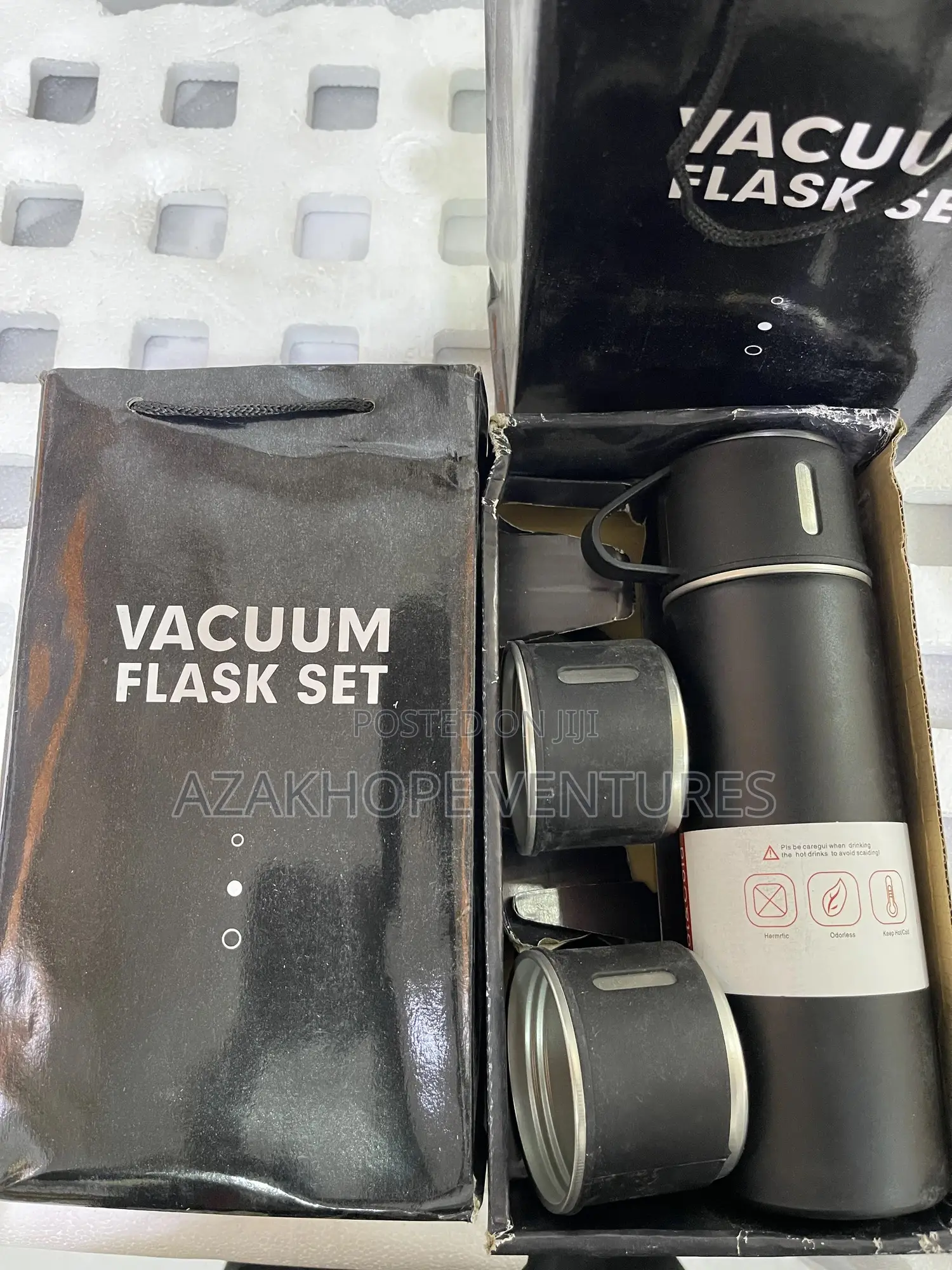 Stainless Steel Vacuum Flask Set With Two Cups.