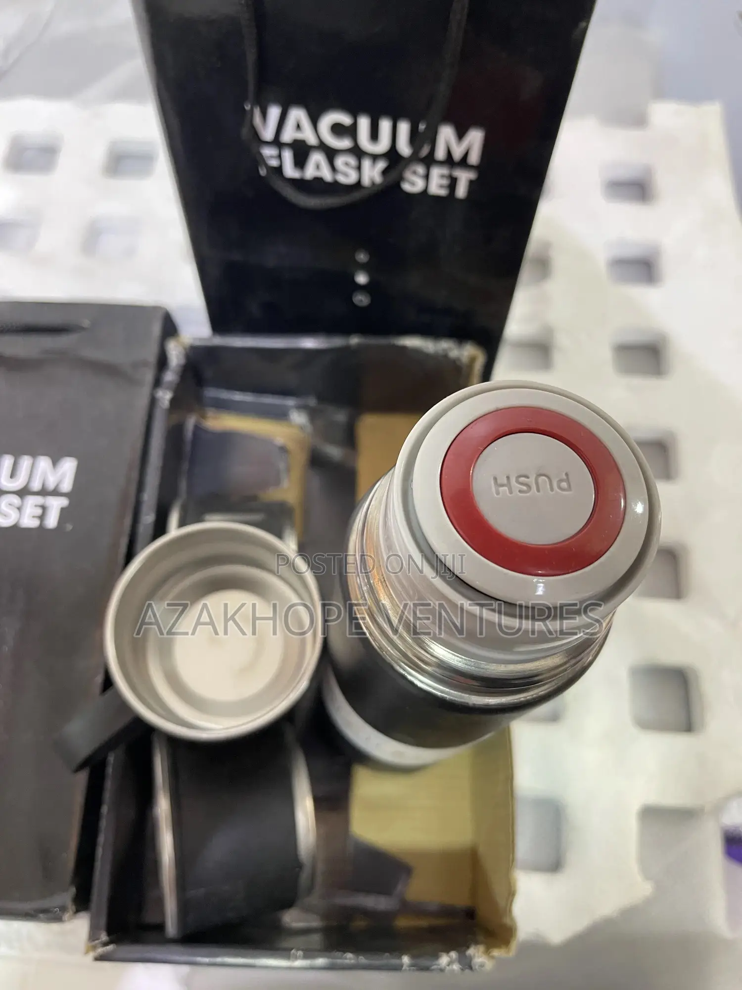 Stainless Steel Vacuum Flask Set With Two Cups.