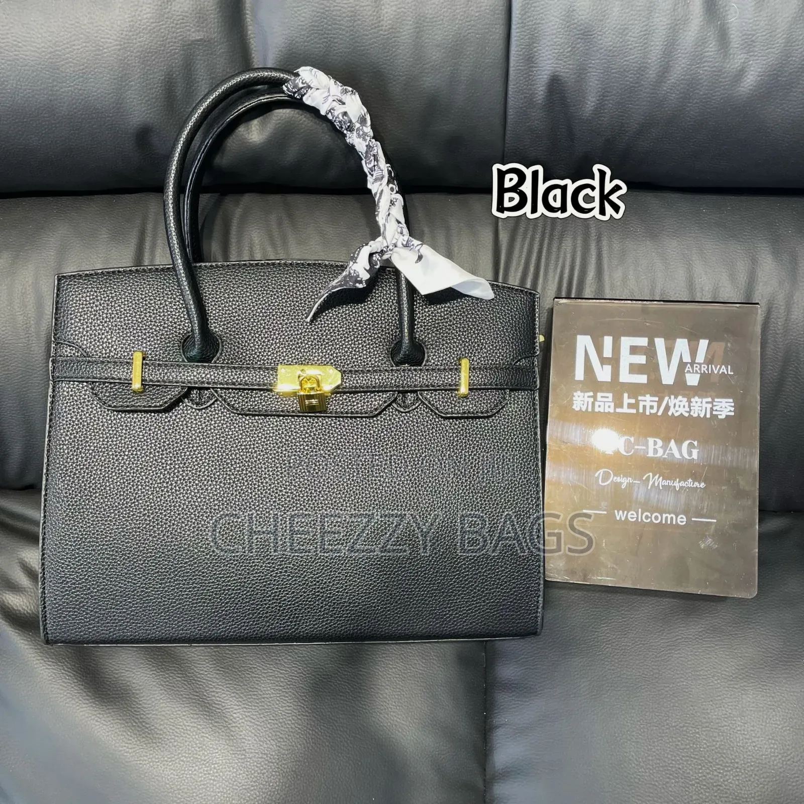 Hand Held Kelly Bag