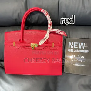 Hand Held Kelly Bag