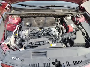 Toyota Camry LE FWD (2.5L 4cyl 8AM) 2018 Red