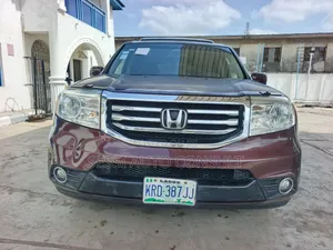 Honda Pilot Touring w/RES/Navi 4WD (3.5L 6cyl 5A) 2013 Burgundy