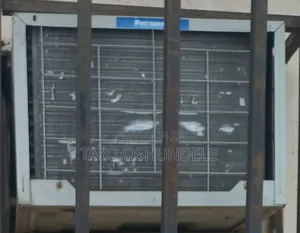 A Fairly Used Window Unit Panasonic Air Conditioner
