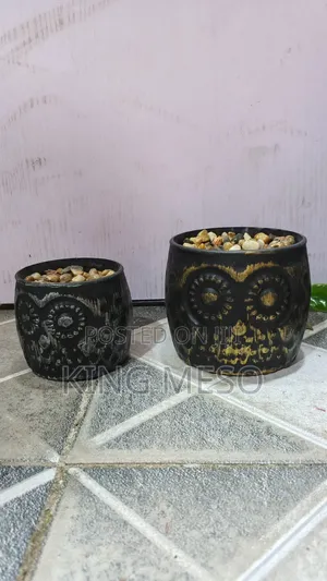 Cup Flower Vase Available as Seen