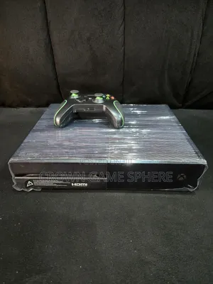 Clean Xbox One With 1 Pad and 2 Games Fc 26 and Wwe 2k25