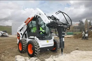 Bobcat With Jack Hammer