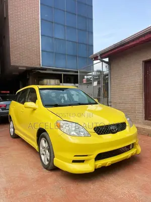 Toyota Matrix XR Hatchback AWD (1.8L 4cyl 4A) 2004 Yellow