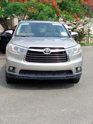 Toyota Highlander XLE 4dr SUV (3.5L 6cyl 6A) 2015 Gold
