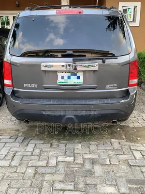 Honda Pilot Touring w/RES/Navi 4WD (3.5L 6cyl 5A) 2012 Gray