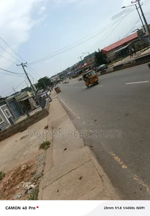 For Sale. A Commercial Land of Half Plot at Ekoro, Abule Egba