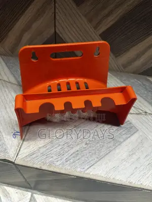 Wall-Mounted Plastic Garden Hose Holder and Accessory Rack.