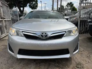 Toyota Camry LE 4dr Sedan w/Prod. End 11/13 (2.5L 4cyl 6A) 2014 Silver
