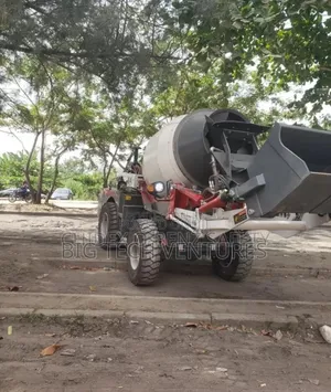Concrete Mixer, Specifically A Self-loading Type Often Found In