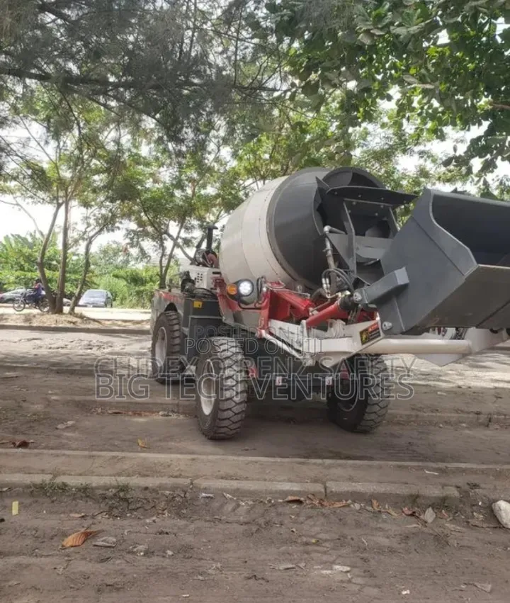 Concrete Mixer, Specifically A Self-loading Type Often Found In