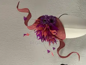 Sinamay Spiral Fascinator With 3 Different Kinds of Feathers
