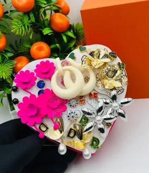 Boxed Earrings, Comes in a Pink Love Shape Box.
