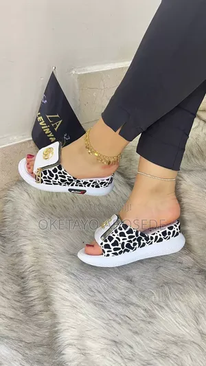 Gucci Leopard Print Slip-on Sandals With a Wedge Heel and Zipper
