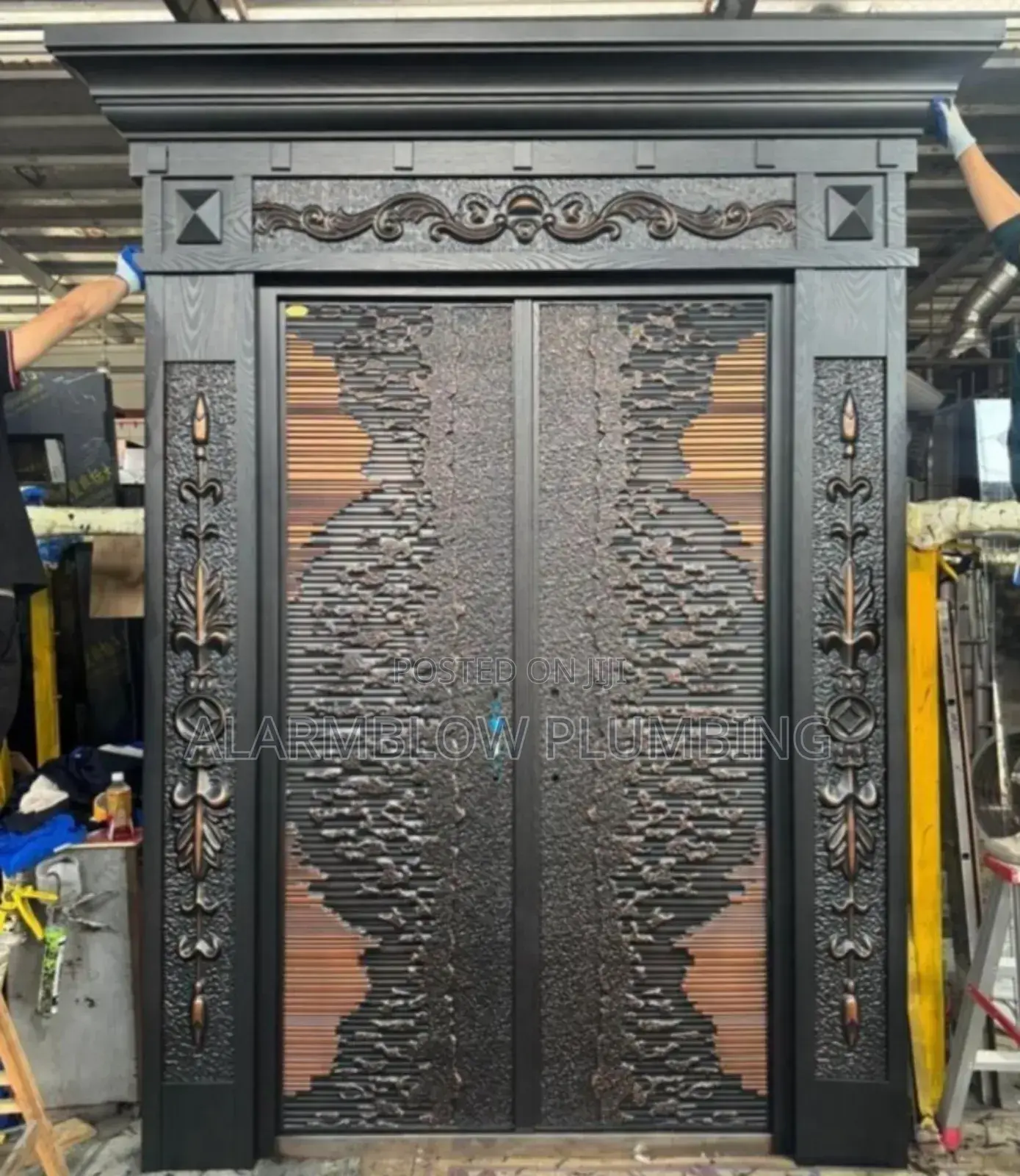 4ft by 7ft German Copper Security Doors With an Arc Wave Design.