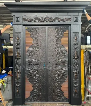 4ft by 7ft German Copper Security Doors With an Arc Wave Design.