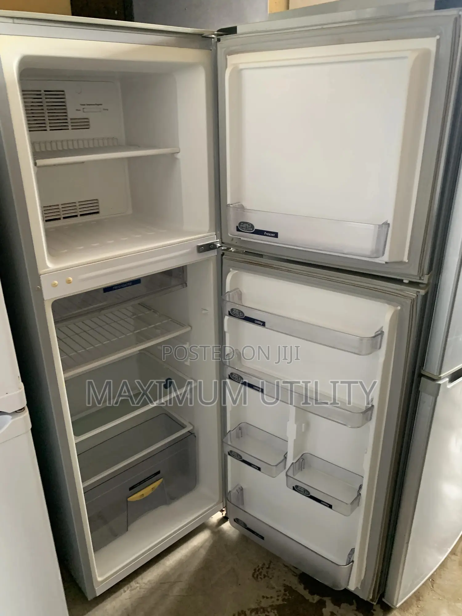 Frigidaire Cool Master Silver Top-Freezer Refrigerator.