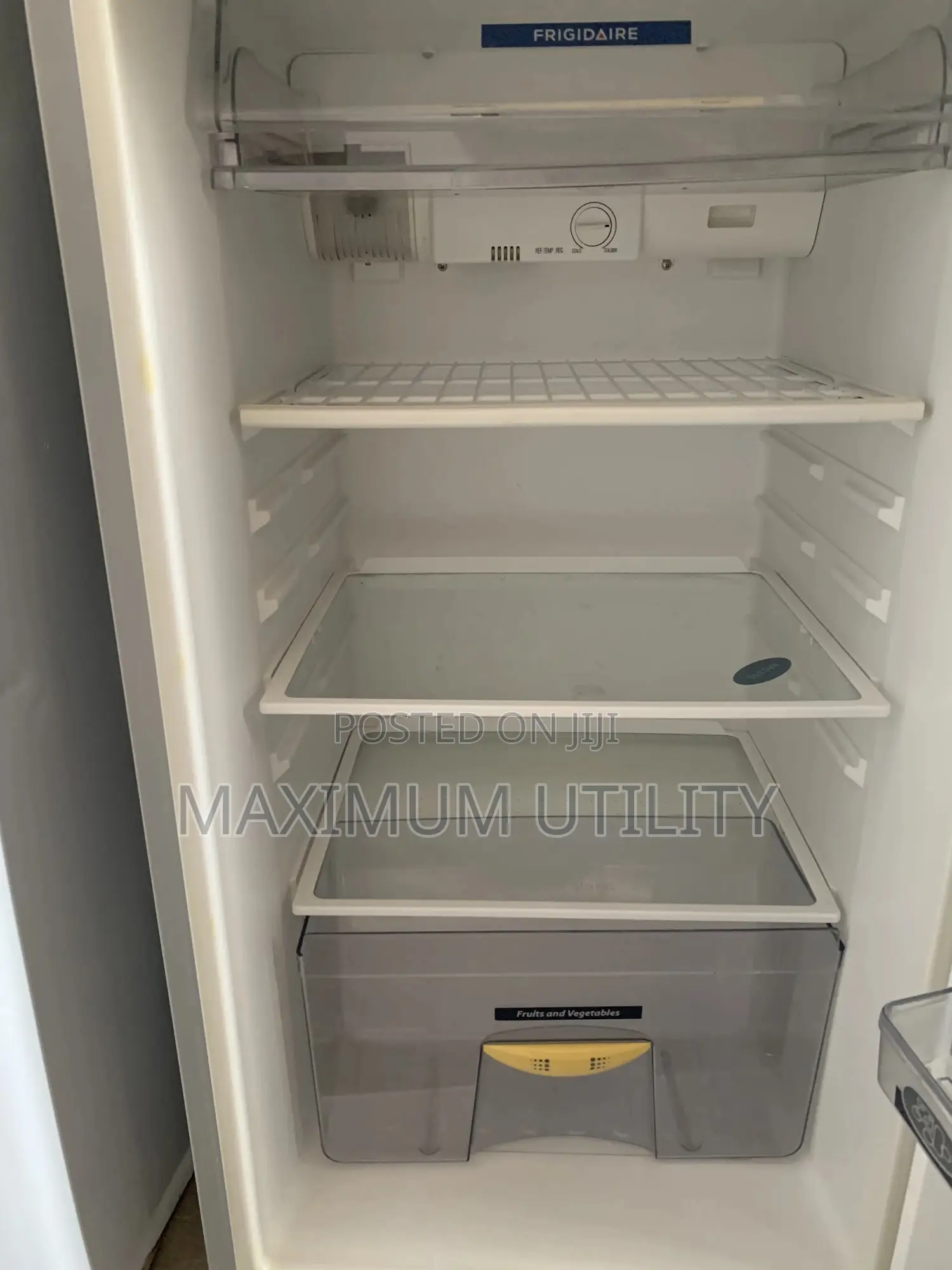 Frigidaire Cool Master Silver Top-Freezer Refrigerator.