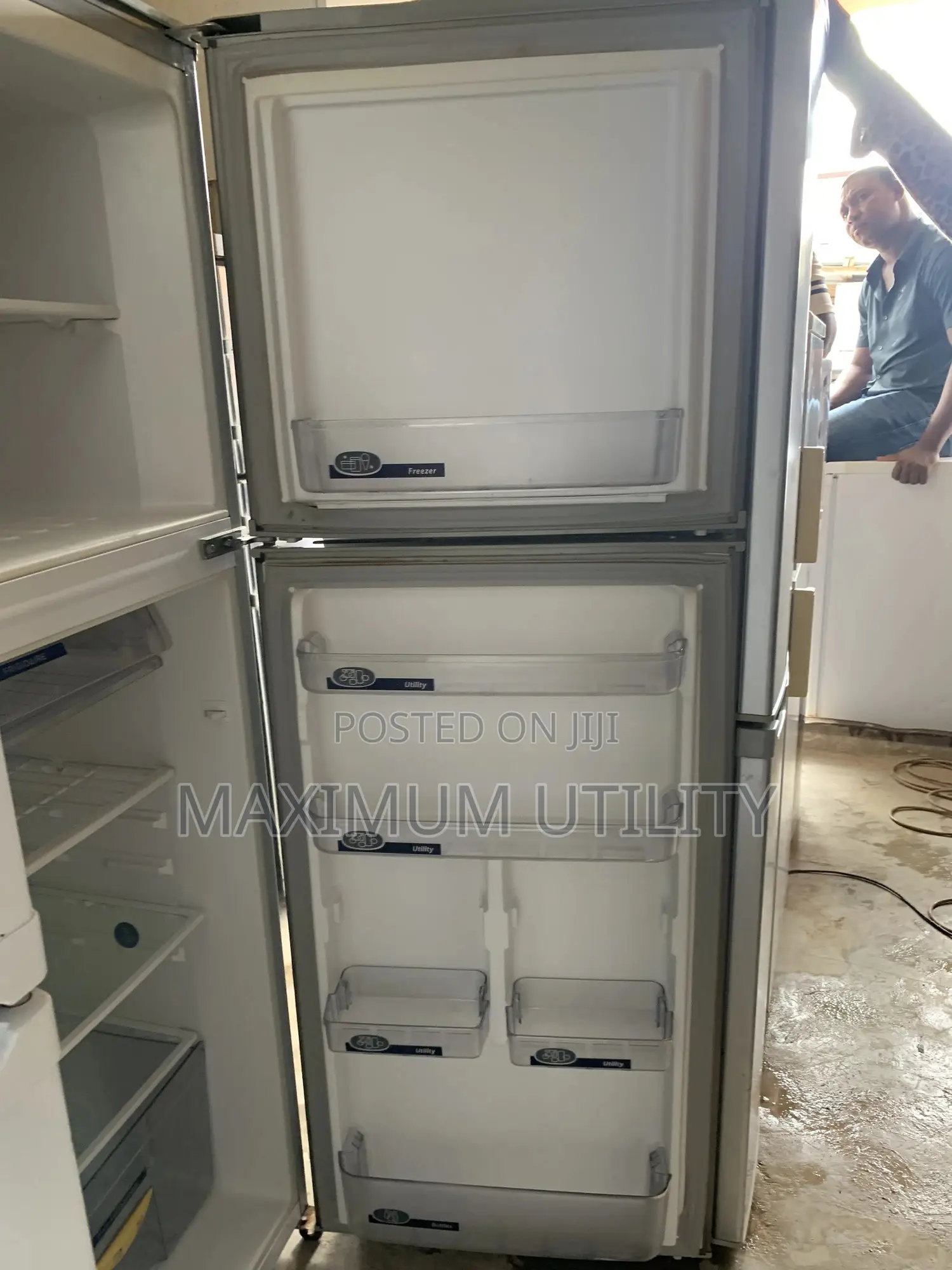 Frigidaire Cool Master Silver Top-Freezer Refrigerator.