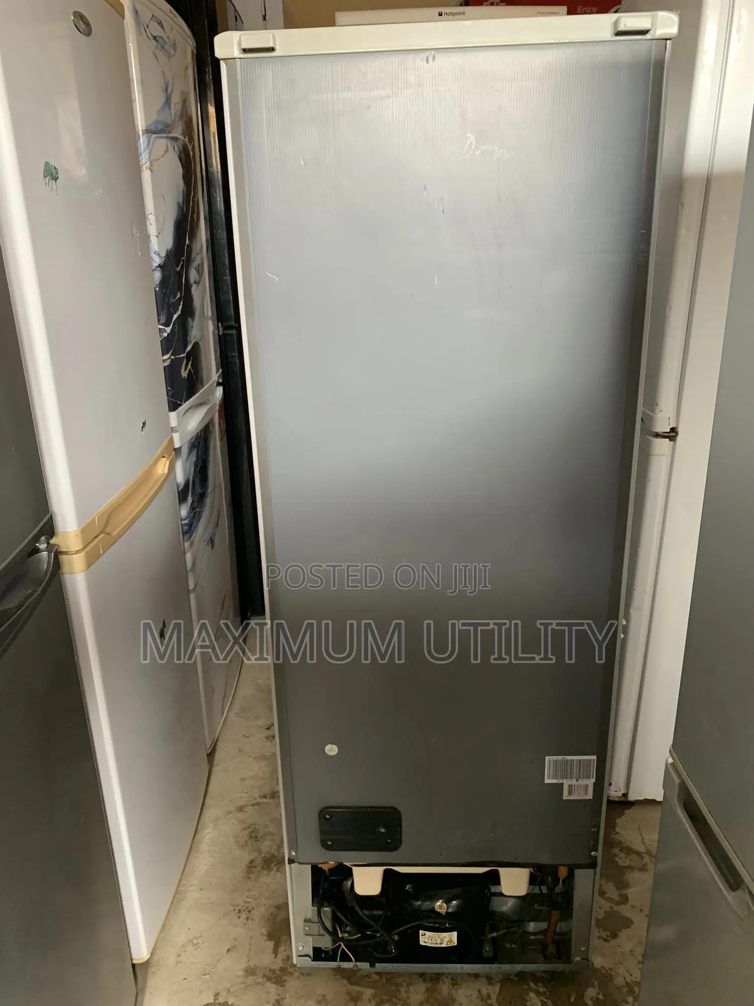 Frigidaire Cool Master Silver Top-Freezer Refrigerator.