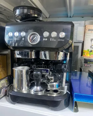 Black Winning Star Espresso Coffee Machine With an Integrated Grinder.