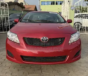 Toyota Corolla LE 4dr Sedan (1.8L 4cyl 4A) 2010 Red