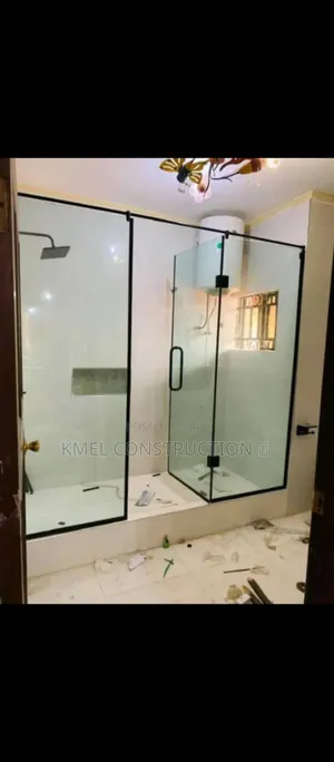 Sleek Black Accessories Shower Glass Cubicle.