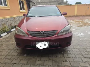 Toyota Camry LE 4dr Sedan (2.4L 4cyl 5M) 2003 Maroon