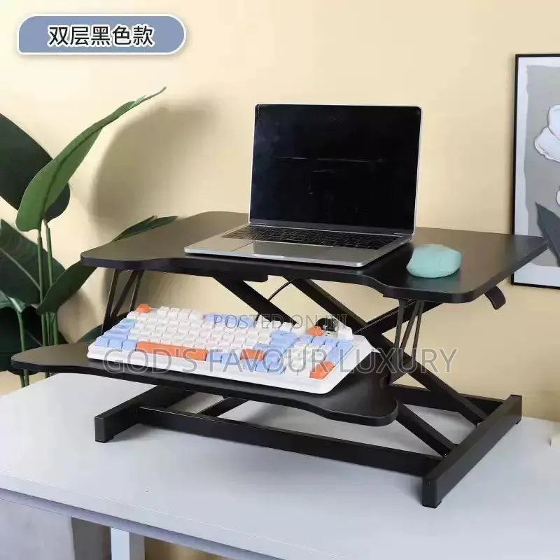 Manual Sit to Stand Adjustable Desk.
