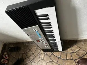 Children Learning Piano