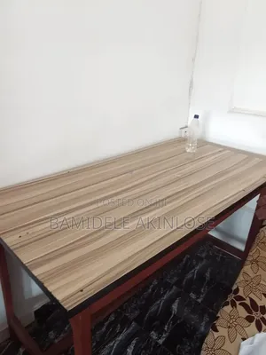 This Is a Table for Multiple Usage for Cutting of Fabrics and Others.