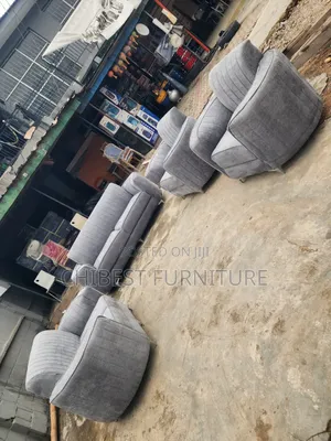 Grey Padded Ulphostery Seven Seaters Chairs.