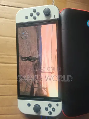 Nintendo Switch Oled With 128gb and Games