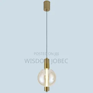 Modern Glass and Brass Globe Pendant Light.