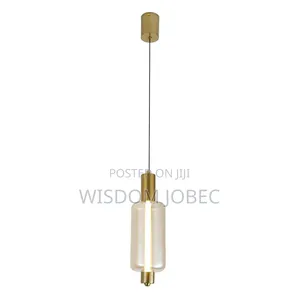 Modern Glass and Brass Globe Pendant Light.