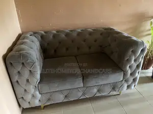 Neat Fairly Used 2-Seater Grey Couch – Comfortable