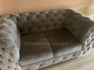 Neat Fairly Used 2-Seater Grey Couch – Comfortable