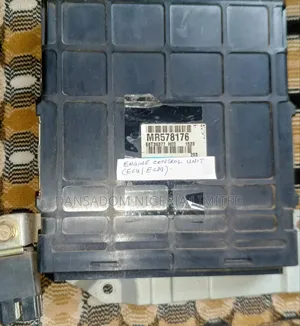 Engine Control Unit (Ecu/Ecm) for a 2002 Mitsubishi Montero Limited.