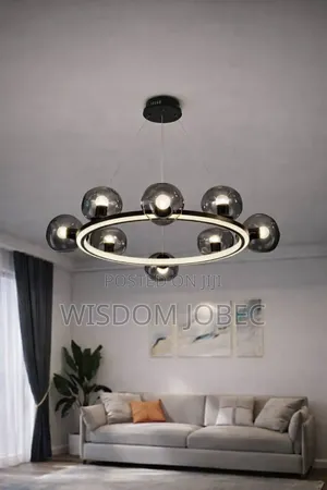 Modern Black Linear Chandelier With Glass Bubble Globes.