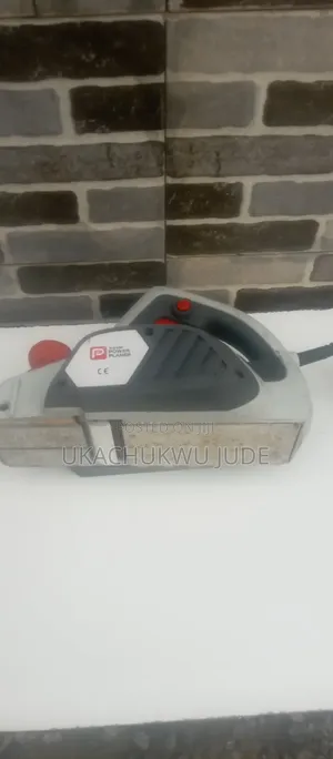 Electric Planer Designed for Resizing and Leveling Wooden Surfaces,