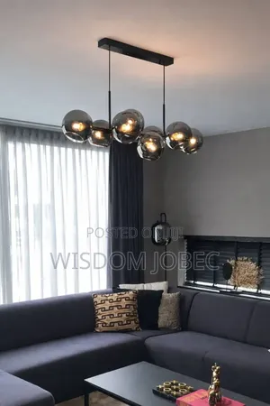 Black Metal and Smoky Glass Linear Bubble Chandelier.