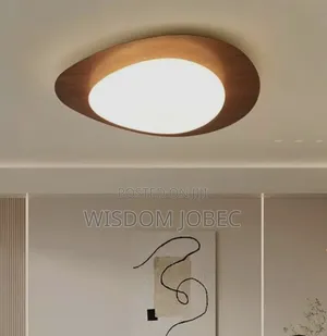 Modern Nordic Pebble-Shaped Ceiling Light With a Walnut Wood