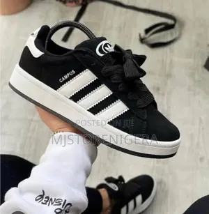 Black and White Adidas Campus 00s Sneakers Featuring a Suede Upper