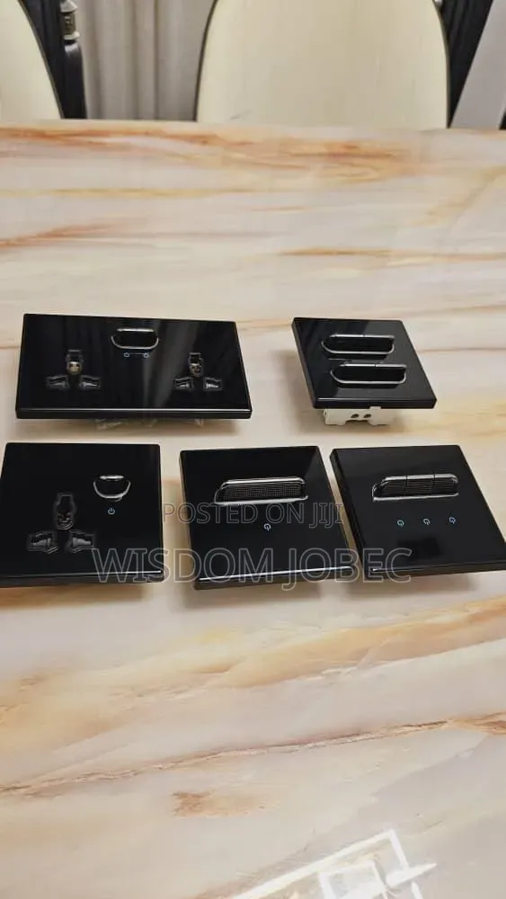 Luxury Electrical Switches and Sockets With Black Glass Panels.